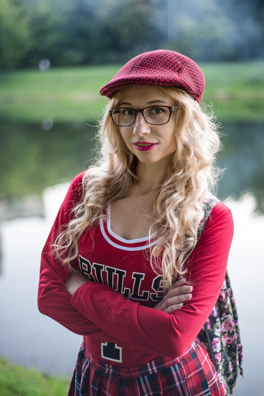 Young college student standing outdoors with a backpack, researching Student Loans, comparing Subsidized vx Unsubsidized Student Loans, exploring options for Student Loans Without a Cosigner, learning about Forgiving Student Loans, and reviewing Truth in Lending information before borrowing.